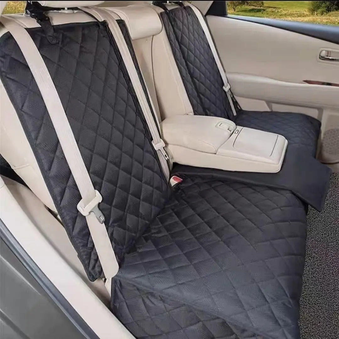 Seat cover installed across a car back seat